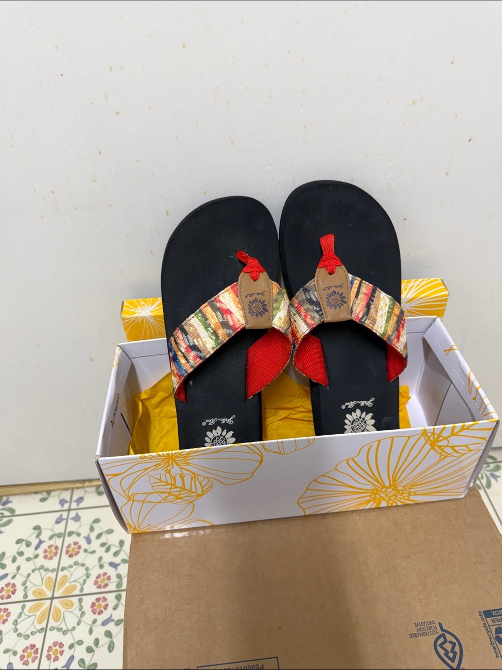 Yellow Box Black Sandals with Red and Multicolor Woven Straps